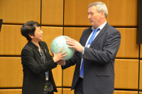 Lee Heng and Rainer Horn holding a ball showing the diversity of soils on our planet.